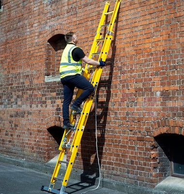 fibreglass extension-ladders in use large